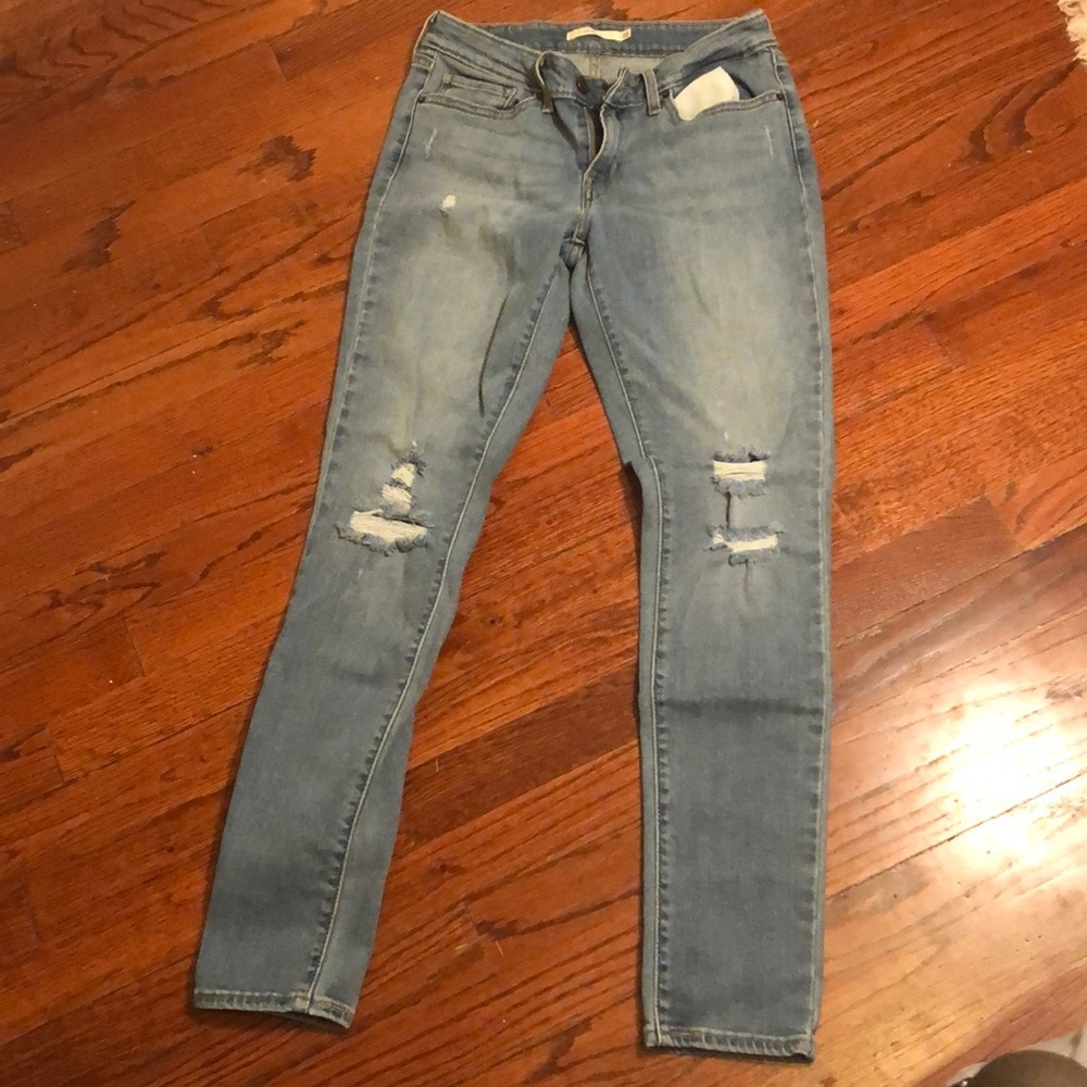 Levi 711 skinny distressed jeans